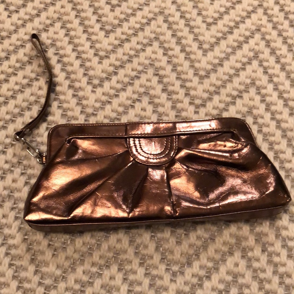 ALDO bronze metallic clutch/wristlet.